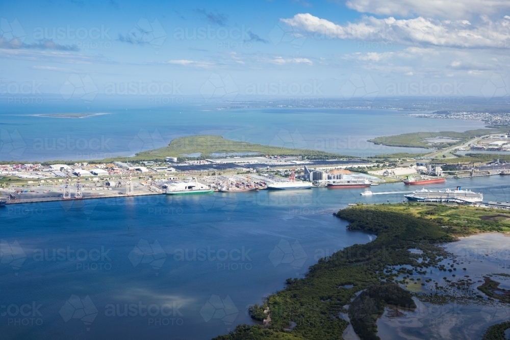 Mouth of the Brisbane River and the Port of Brisbane facility from aerial view - Australian Stock Image