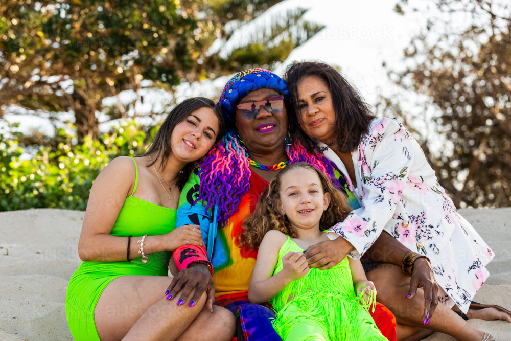Multi-generation of Torres Strait Islander family with grandmother, daughters, and granddaughters - Australian Stock Image