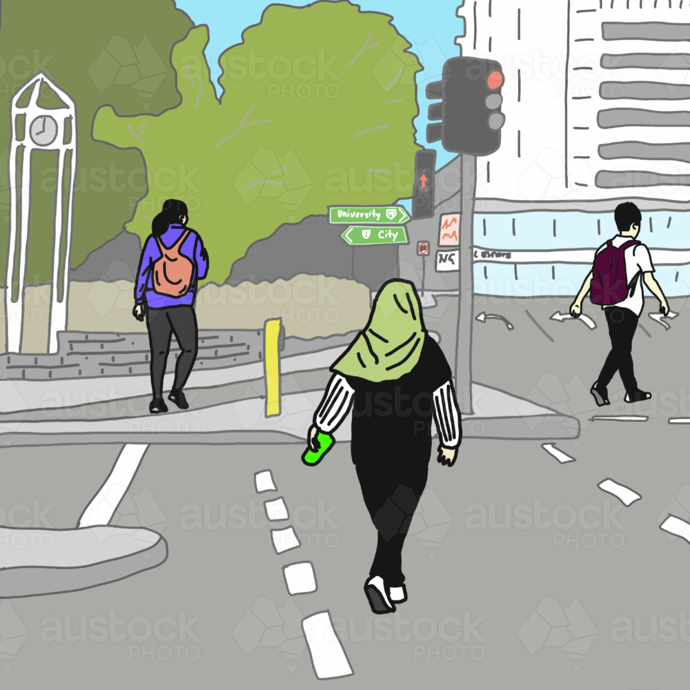 Multicultural people crossing road at city intersection - Australian Stock Image