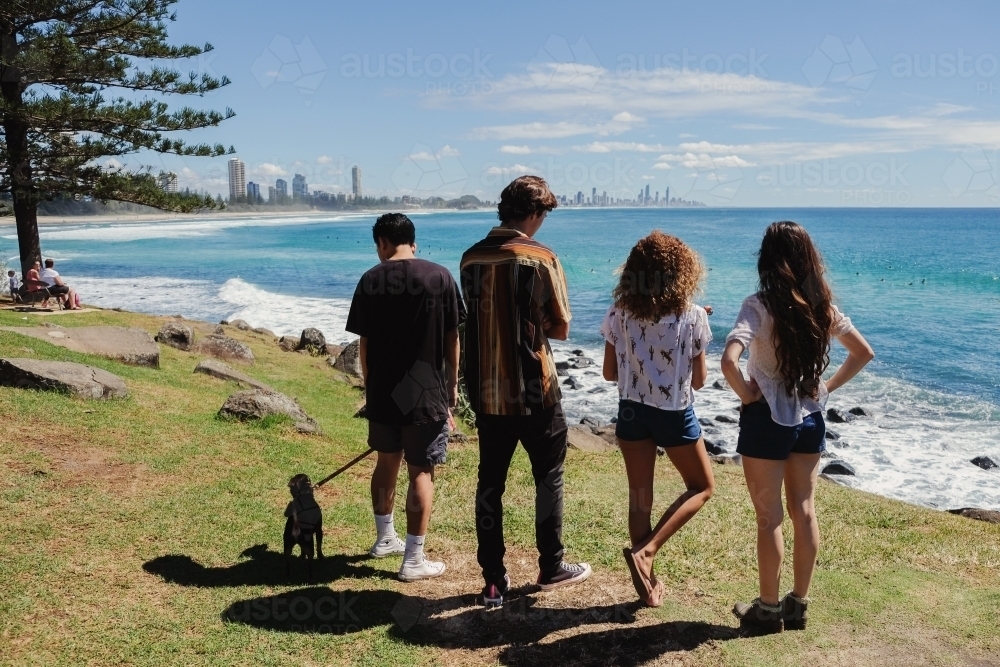 Multicultural teenagers hang out near the beach - Australian Stock Image