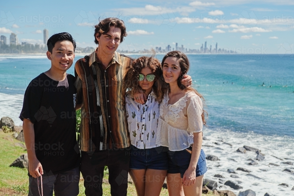 Multicultural teenagers hang out near the beach - Australian Stock Image