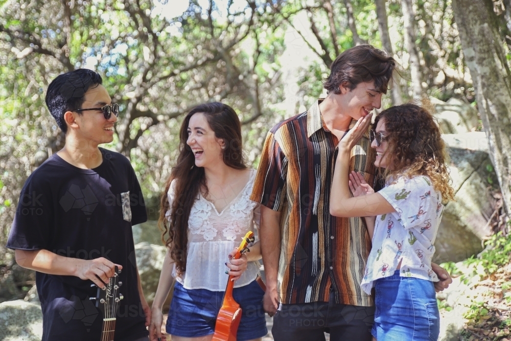 Multicultural teenagers hanging out : Austockphoto Multicultural teenagers hanging out - Australian Stock Image