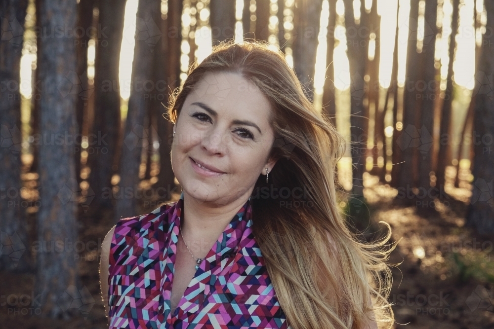 Multicultural woman in the wood - Australian Stock Image