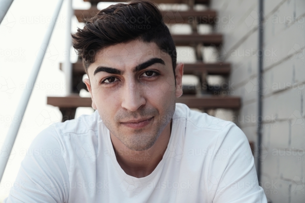 multicultural young adult man, university student - Australian Stock Image