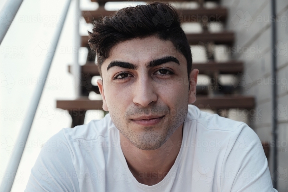 Multicultural young adult man, university student - Australian Stock Image