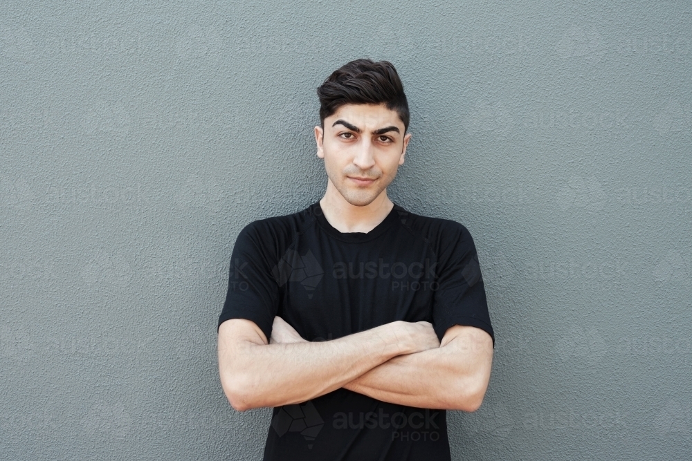 multicultural young adult man, university student - Australian Stock Image