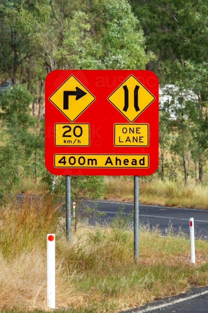 One Lane Rd Image of Narrow one lane road sign before Burnett River bridge near ...
