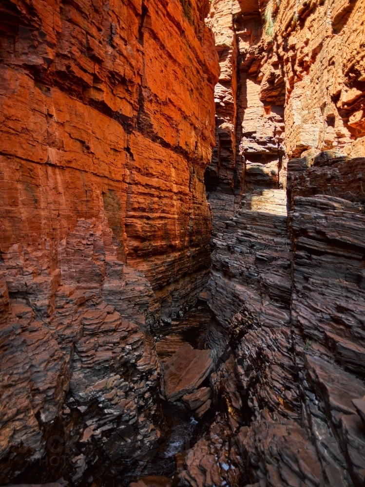 Narrow walking trail in remote gorge - Australian Stock Image