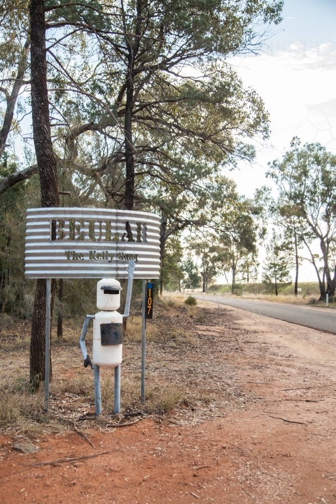 Ned Kelly Bushranger mailbox outside rural property - Australian Stock Image
