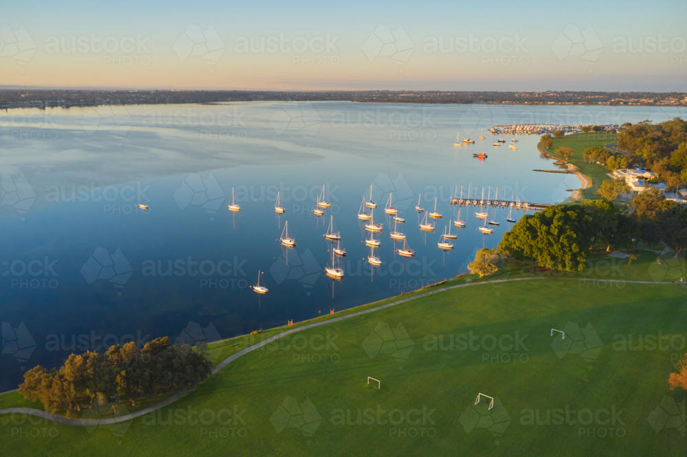 Nedlands Foreshore aerial view with yachts in the early morning - Australian Stock Image