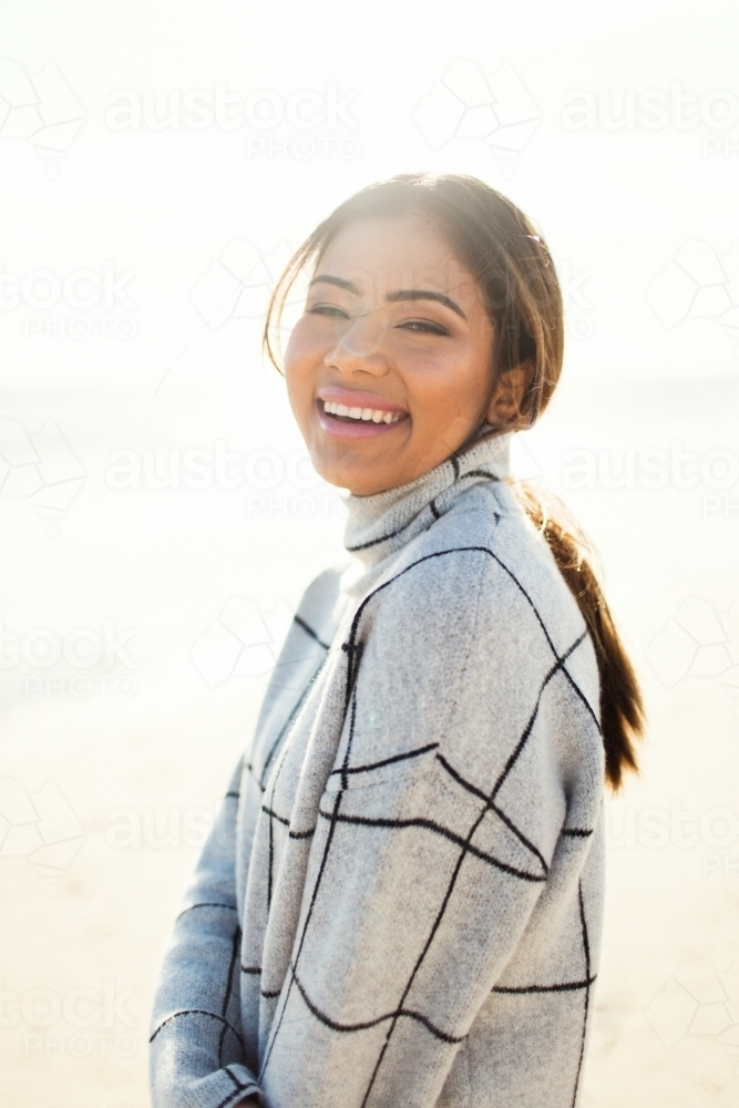 Nepalese teenage girl laughing and posing - Australian Stock Image
