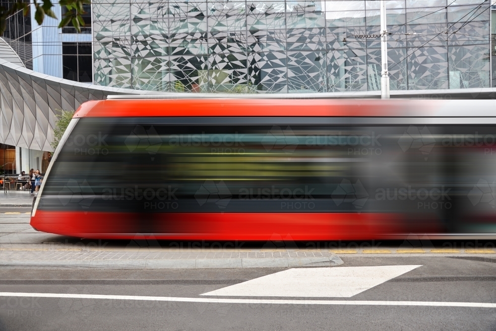 New tram driving in Sydney city - Australian Stock Image
