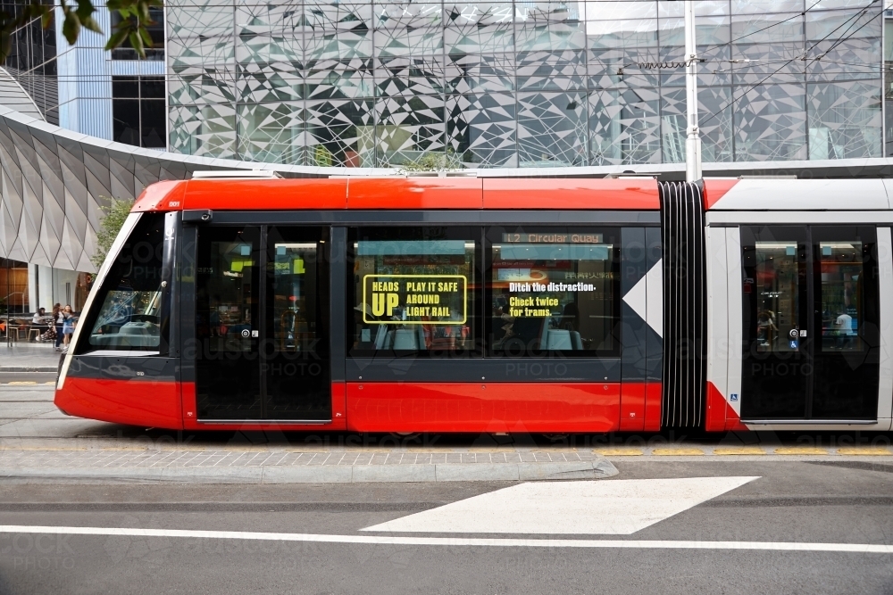 New tram driving in Sydney city - Australian Stock Image