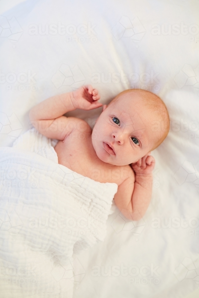 Newborn baby laying down - Australian Stock Image