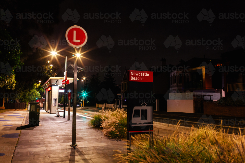 Newcastle Beach Light Rail public transport station at night - Australian Stock Image