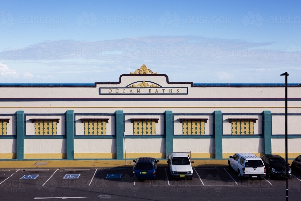 Newcastle Ocean Baths facade at dusk in summer - Australian Stock Image