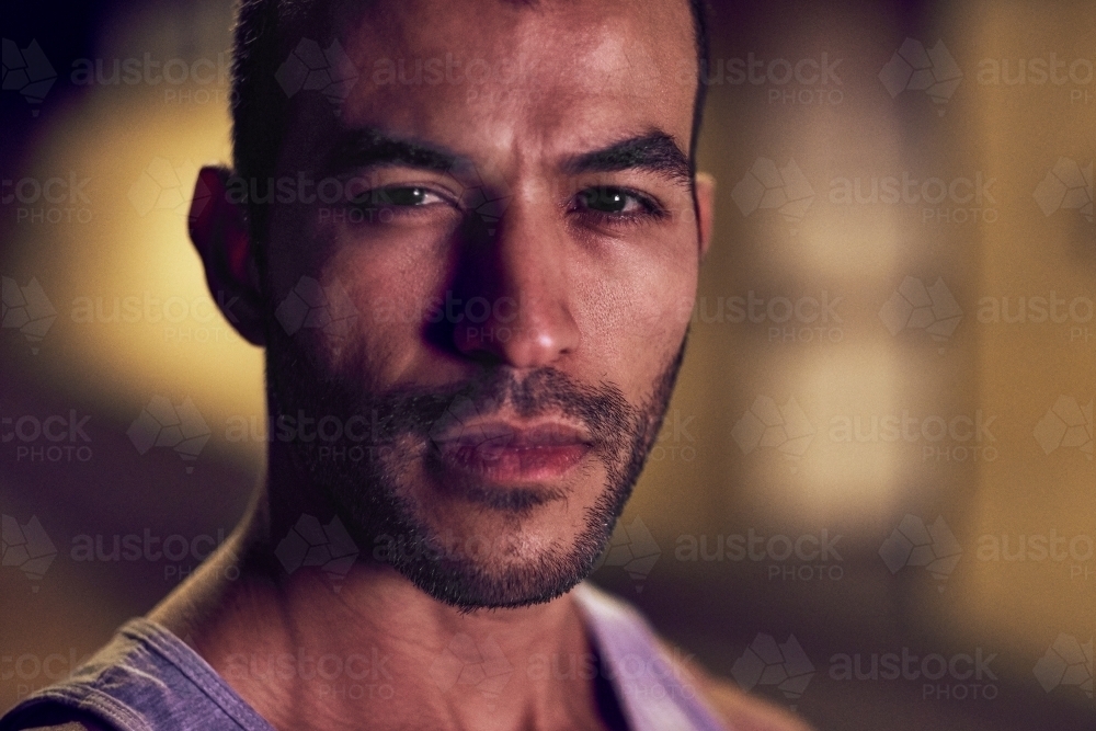 Portrait of man at night - Australian Stock Image