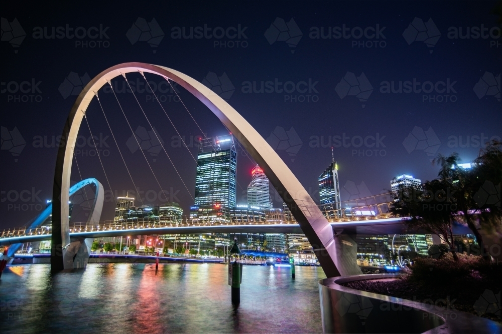 Night time in Perth at the Elizabeth Quay bridge looking at the city - Australian Stock Image