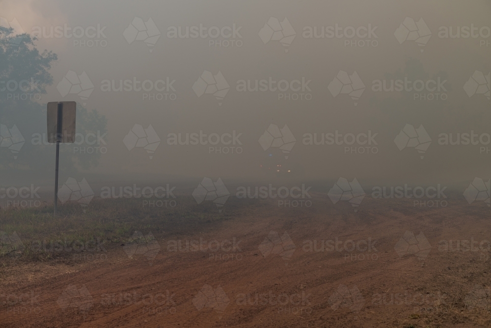 Nil visibility at fire in Howard Springs - Australian Stock Image