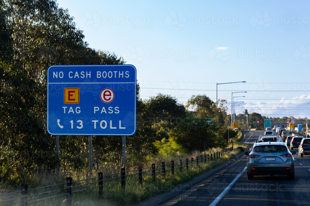 Image of No cash booths e tag e-pass sign beside toll road highway ...