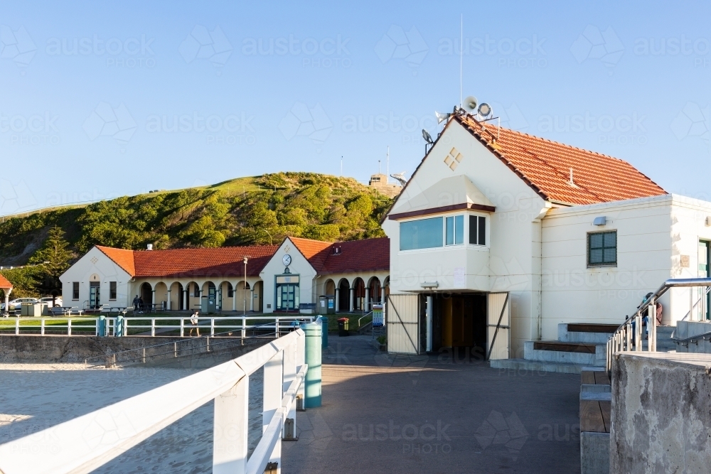 Nobbys Beach surf pavilion on quiet winter afternoon by the seaside - Australian Stock Image