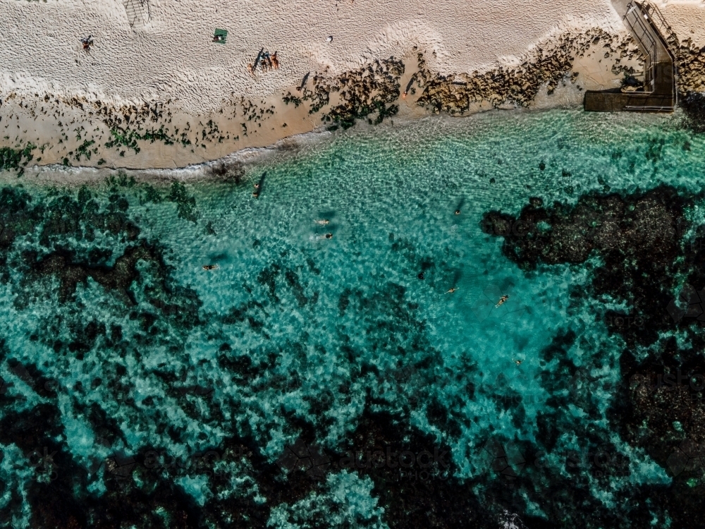 Top down view of limestone bay and shoreline at Mettams Pool, North Beach - Australian Stock Image