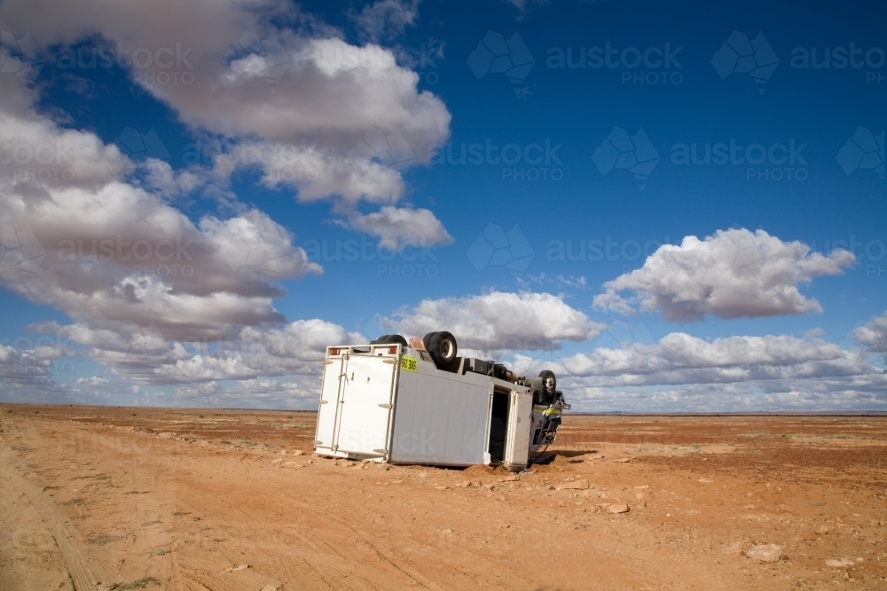Over turned milk van on the Oodnadatta track - Australian Stock Image