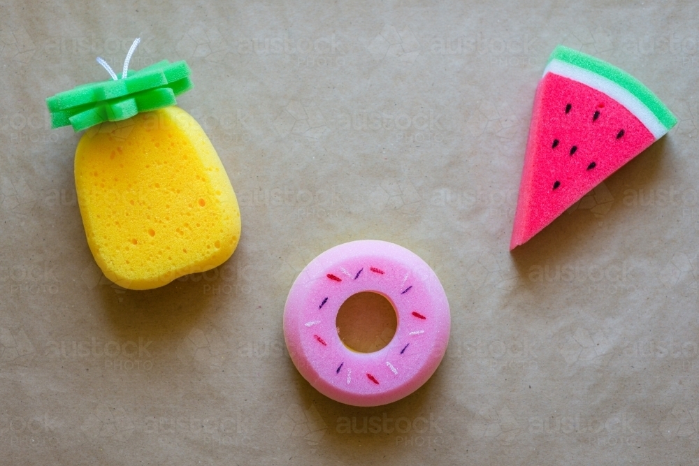 novelty sponges on a plain paper background - Australian Stock Image