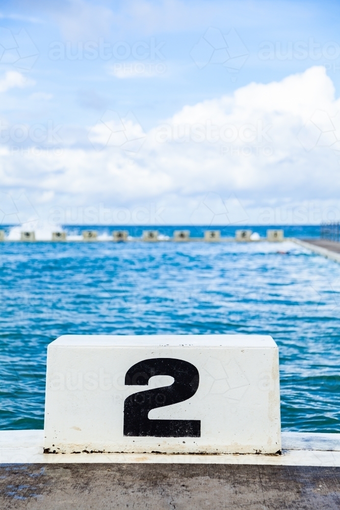 Numbered swimming lanes at ocean pool - Australian Stock Image