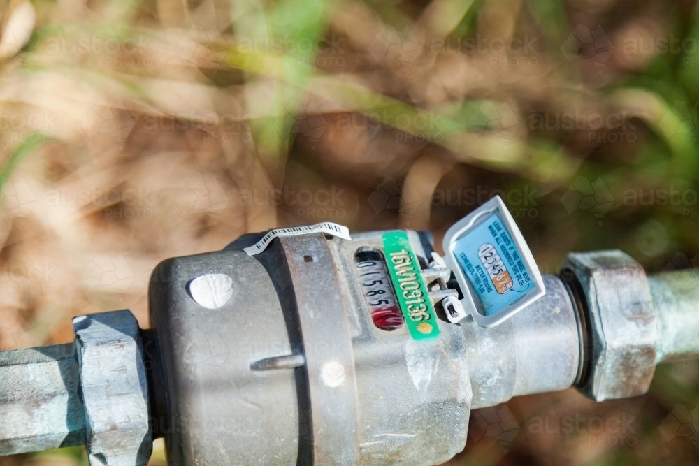 Numbers on water meter for home - Australian Stock Image