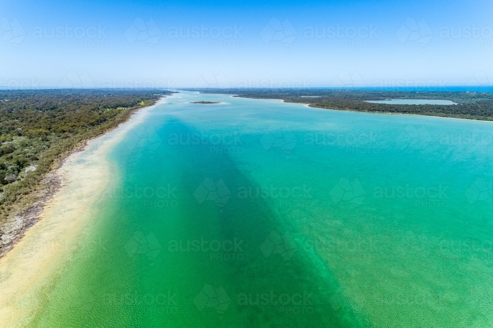 Oblique aerial view of a green lake - Lake Clifton. - Australian Stock Image