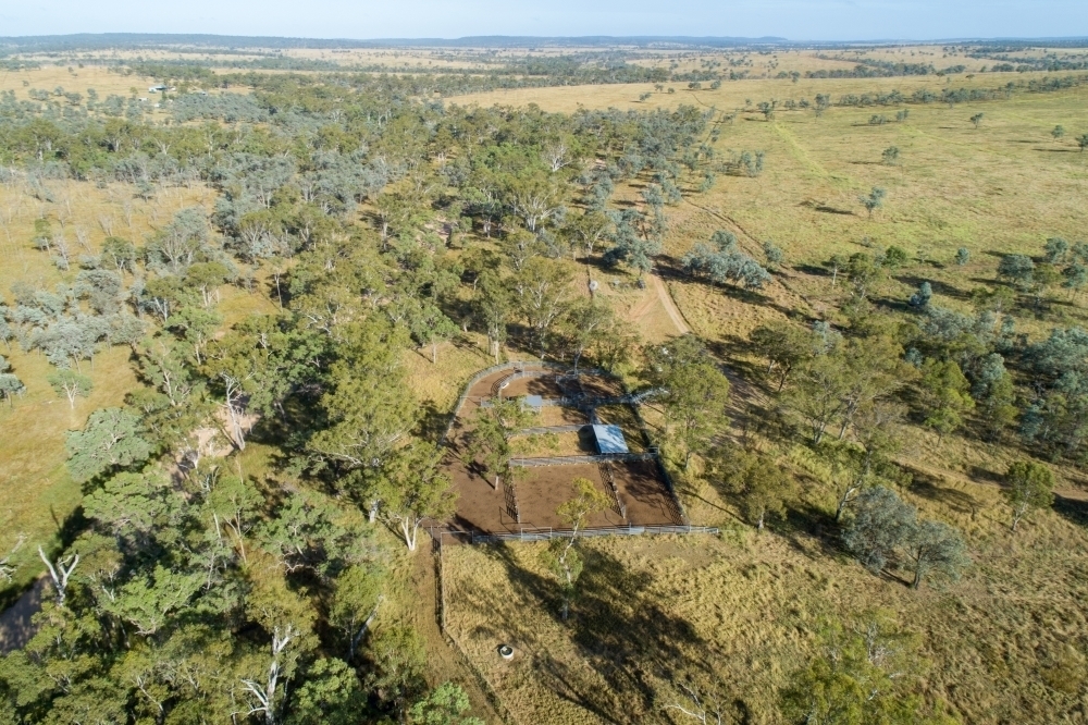 Oblique aerial view of cattle yards and farm. - Australian Stock Image