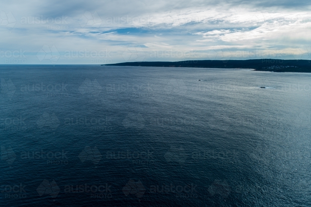 Oblique aerial view of coastline and lots of ocean. - Australian Stock Image