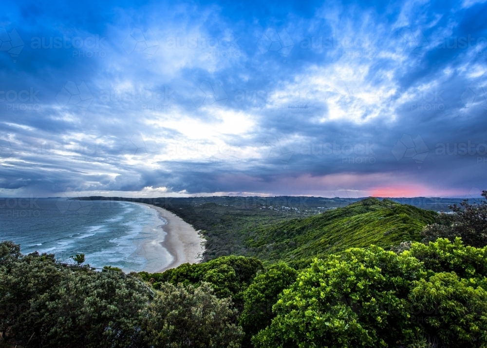 Ocean beach on a cloudy dusk evening - Australian Stock Image