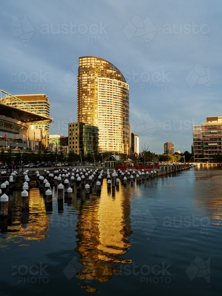 Office Building Reflected in Victoria Harbour - Australian Stock Image