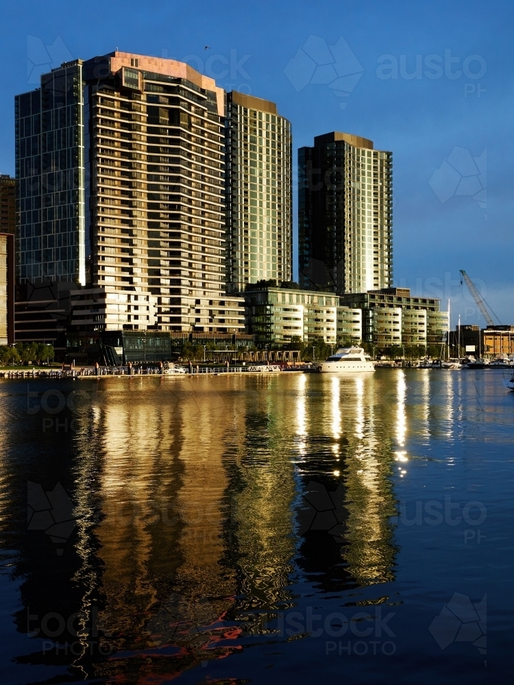 Office Buildings Glowing in Evening Sun in Docklands - Australian Stock Image