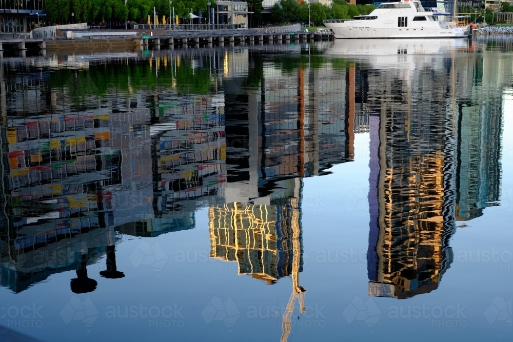 Office Buildings reflected in Victoria Harbour - Australian Stock Image