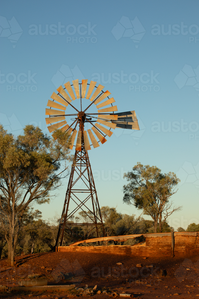Old abandoned windmill and turkey nest - Australian Stock Image
