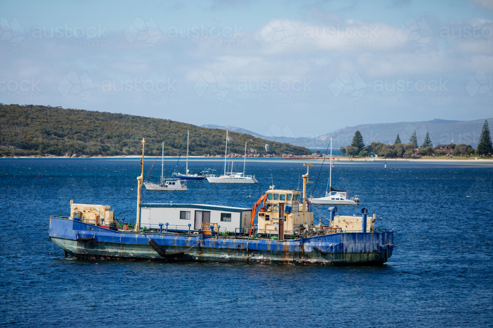 Old barge covered in rust - Australian Stock Image
