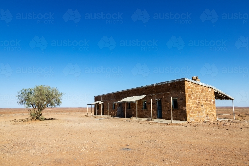 old building in desert landscape - Australian Stock Image