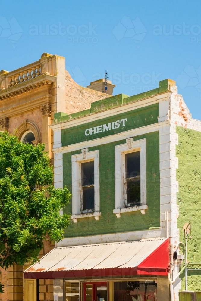 old building with the word chemist - Australian Stock Image