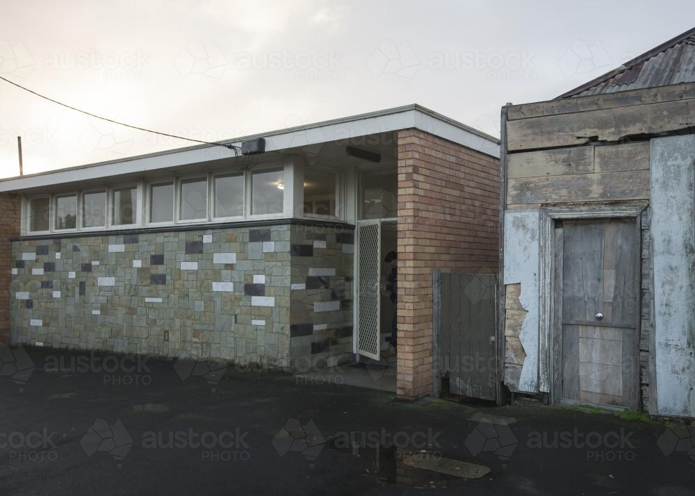 Old buildings along street on an overcast afternoon - Australian Stock Image