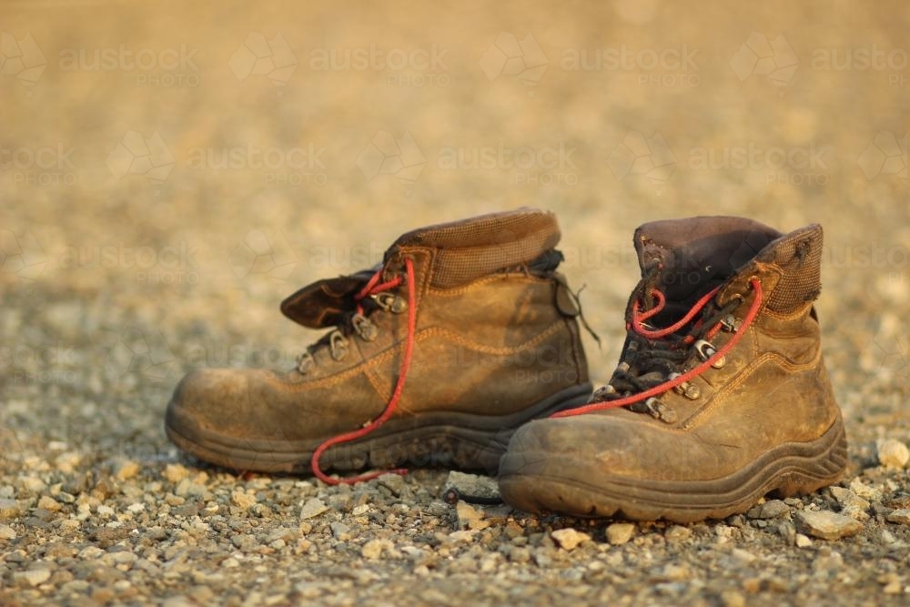 Old empty work boots - Australian Stock Image