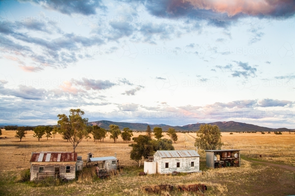 Old farm sheds in the evening light - Australian Stock Image
