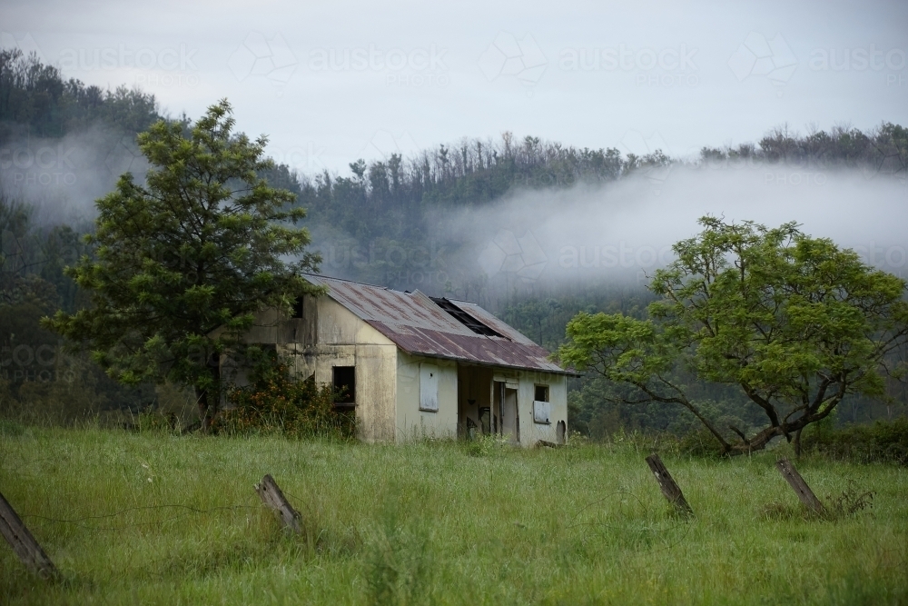 Old homestead in rural landscape - Australian Stock Image
