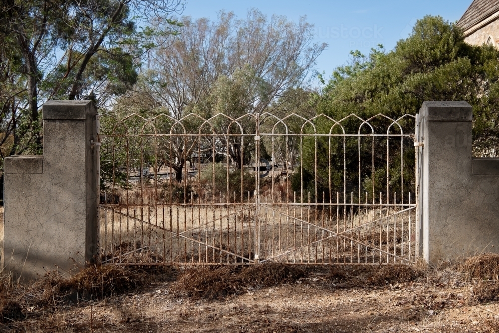 Old iron gates in country town - Australian Stock Image