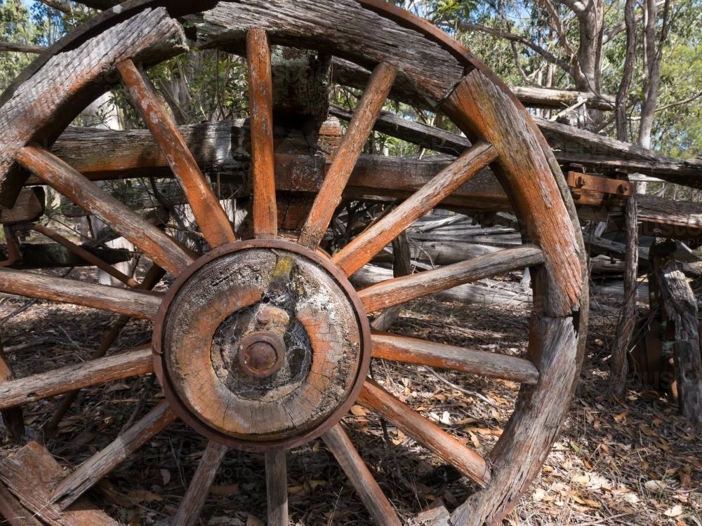 Old partly broken wagon wheel - Australian Stock Image