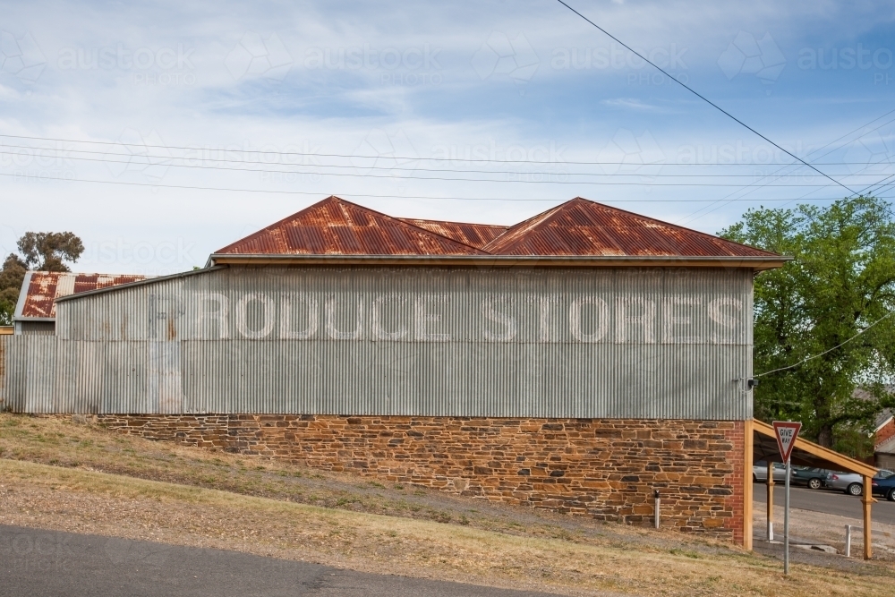 Old produce store with faded signage - Australian Stock Image
