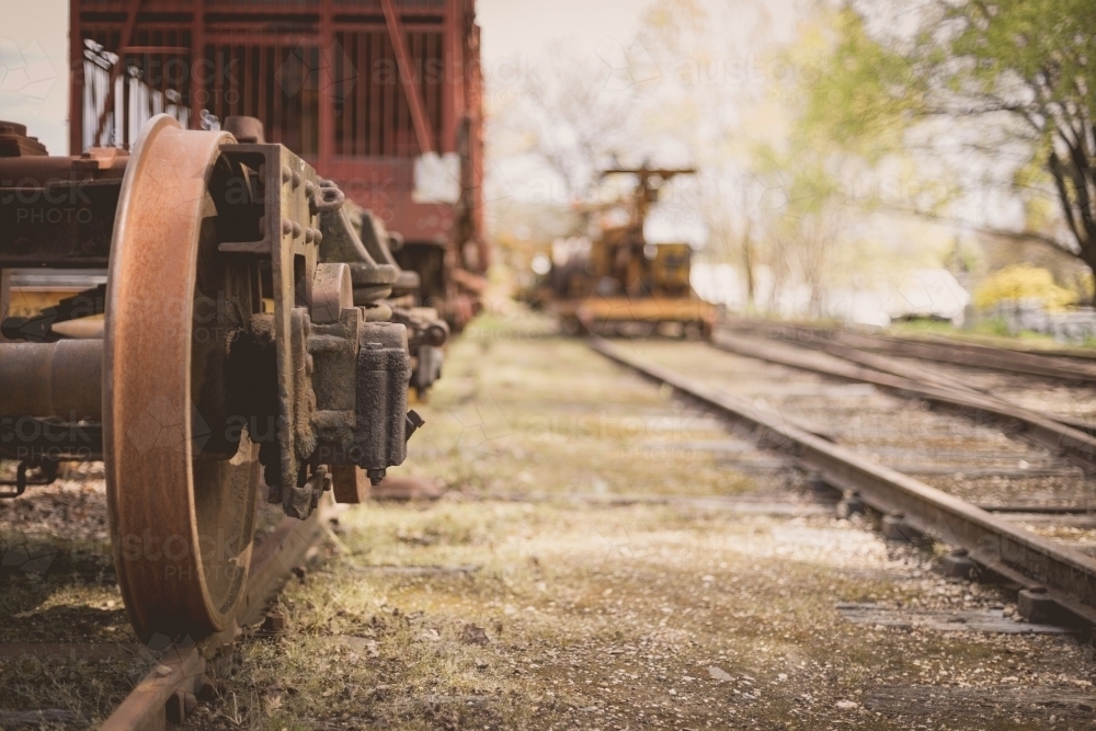 Old rusted cargo train carriage in country railyard - Australian Stock Image
