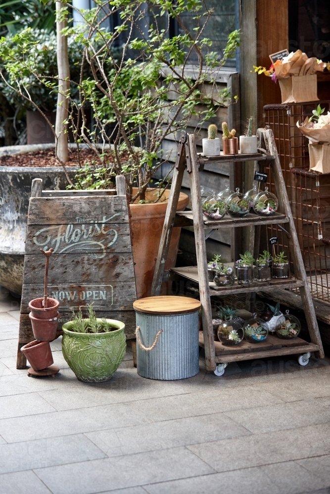 Old rustic setting with plants for sale - Australian Stock Image